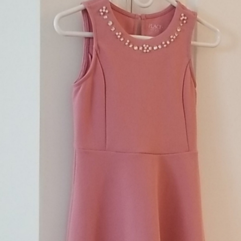 Mauve color with stone fits dress for size 10